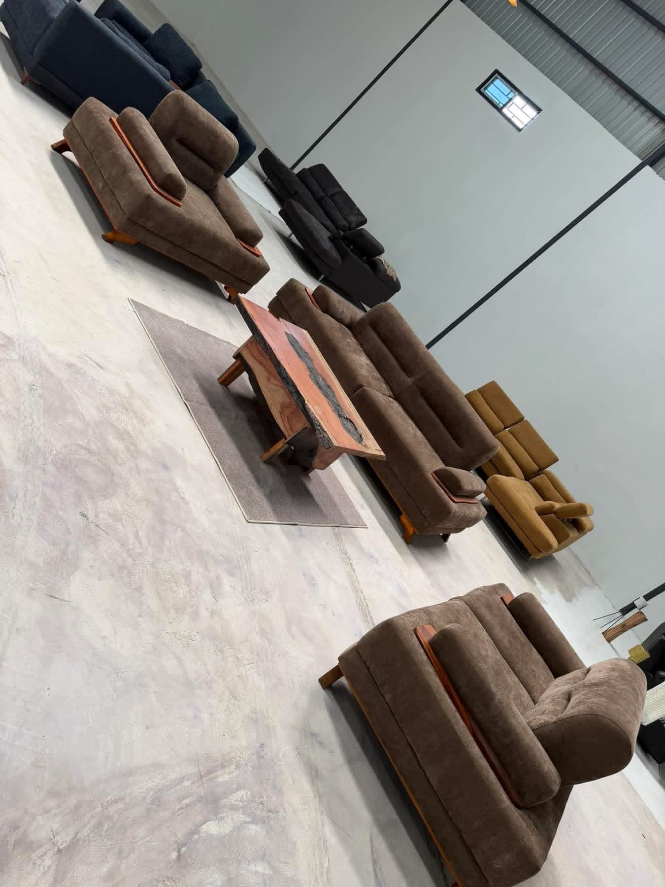 Collection of suede armchairs in the Miyoba Innovations workshop